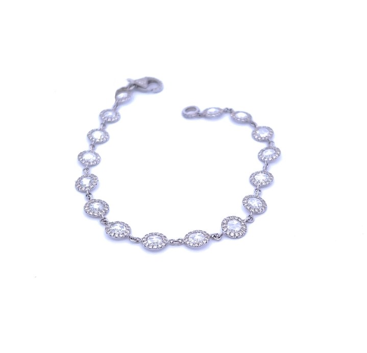 18Kt White Gold Bracelet With Rosecut Diamonds Weighing 1.94ct And Round Diamond Halos Weighing 0.97ct