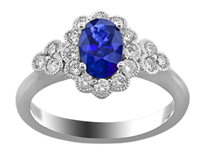 18Kt White Gold Ring With (1) Oval Sapphire Weighing 1.00ct And (18) Round Diamonds Weighing 0.45ct