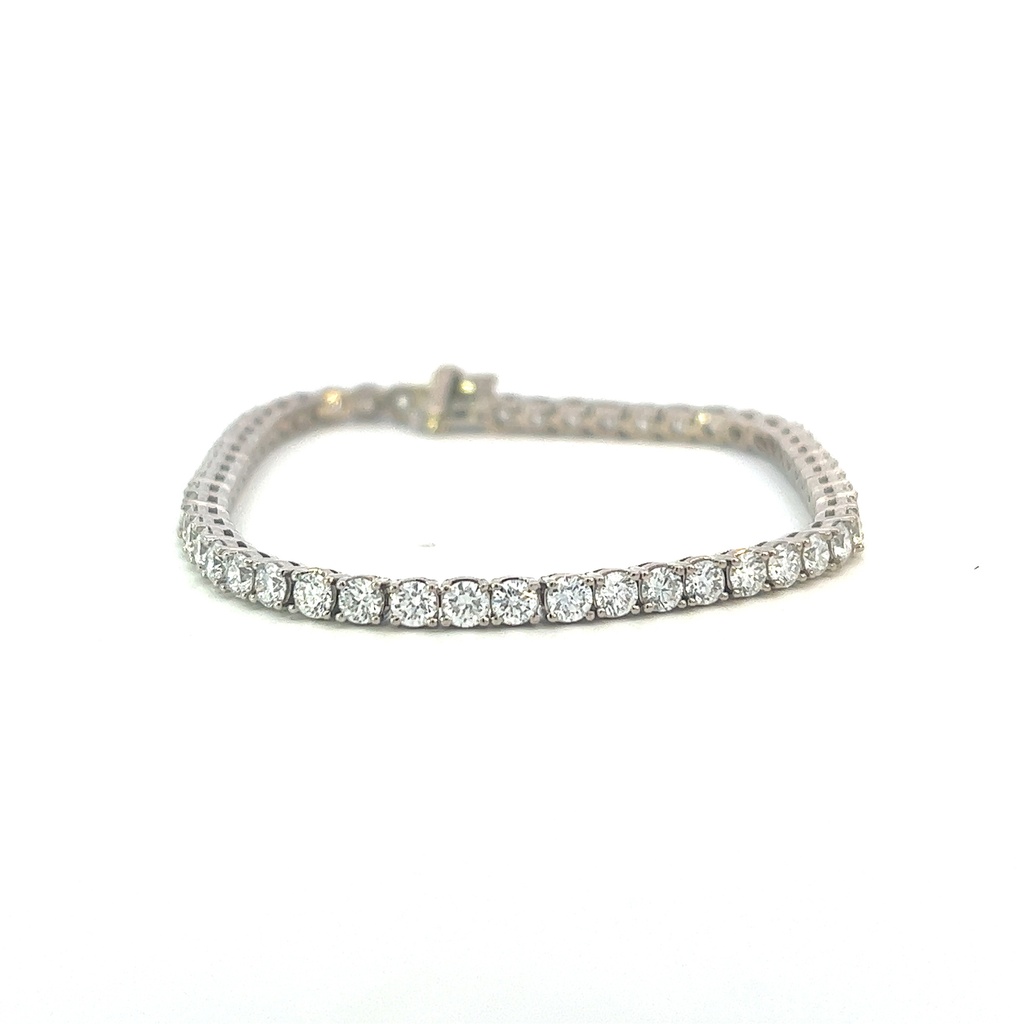 14Kt White Gold Diamond Tennis Bracelet With (54) Round Diamonds Weighing 6.06cttw