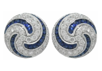 18Kt White Gold Swirl Studs With (52) French Cut Sapphires Weighing 2.13ct And (54) Round Diamonds Weighing 0.88ct