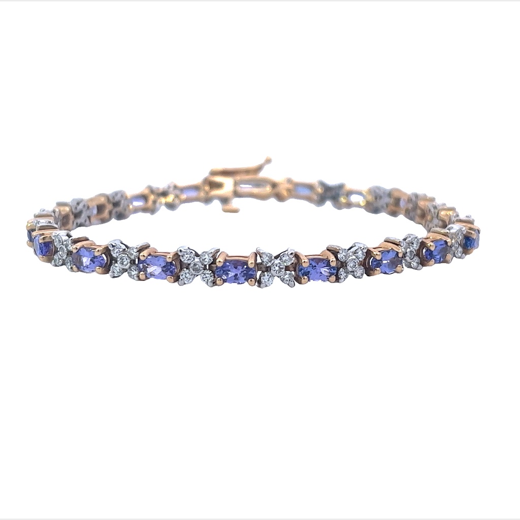 14Kt Two Toned Tennis Bracelet With 19 Oval Tanzanites Weighing 4.65ct And 95 Round Diamonds Weighing 1.85ct