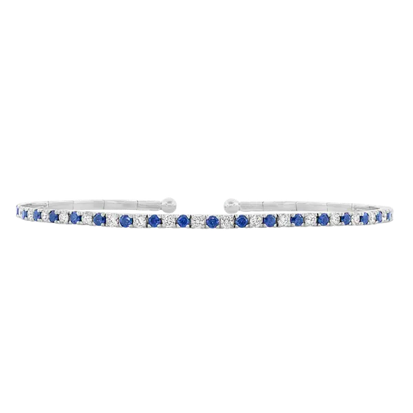 18Kt White Gold Bangle With (19) Round Sapphires Weighing 0.76ct And (20) Round Diamonds Weighing 0.60ct