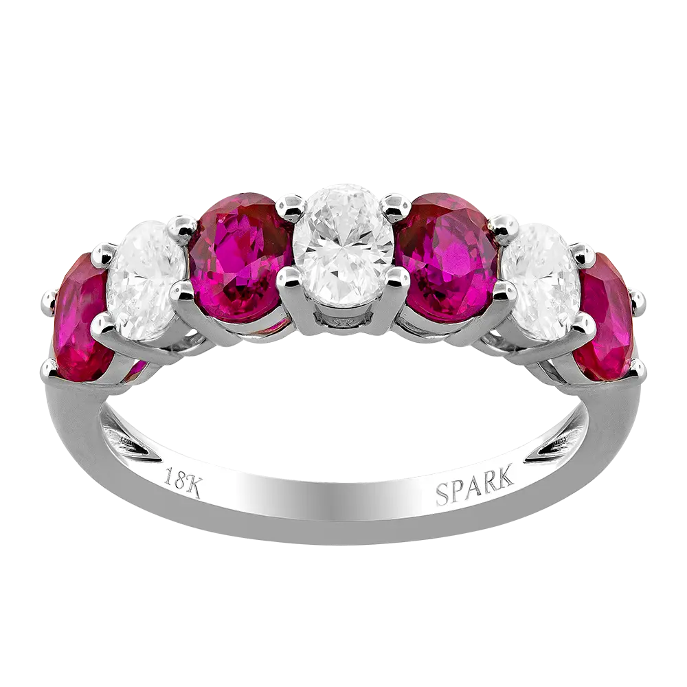 18Kt White Gold Alternating Band With (4) Oval Rubies Weighing 1.40ct And (3) Oval Diamonds Weighing 0.60ct