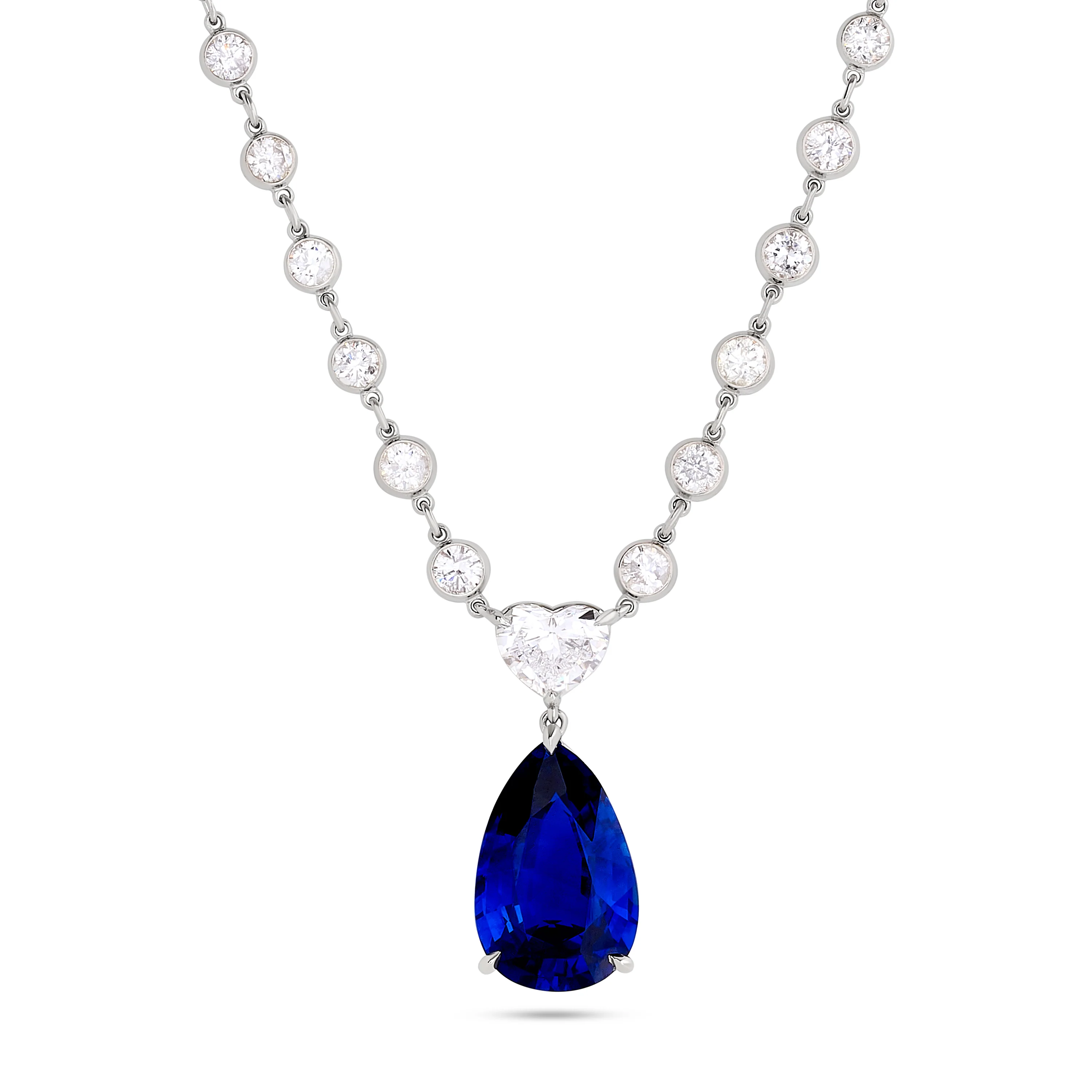 [PPHP40180-P] Platinum Necklace with A Pear Shaped Sapphire Weighing 7.04ct, A Heart Shaped Diamond Weighing 0.85ct, And (68) Round Diamonds Weighing 6.52ct