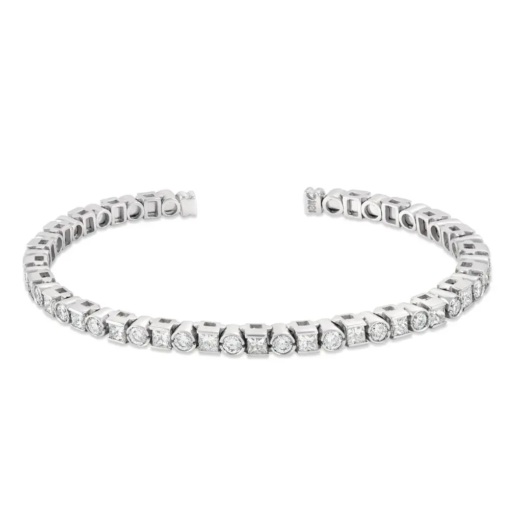 Cuff Bracelet With (25) Rounds And (24) Princess Cut Diamonds Weighing 4.45cttw In 18Kt White Gold