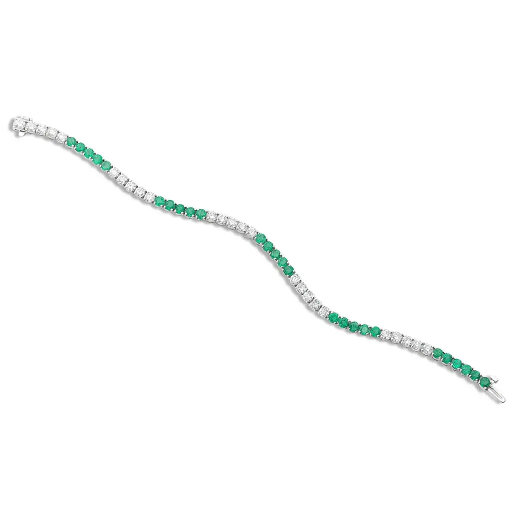 Line Bracelet With (26) Round Emeralds Weighing 3.80ct And (25) Round Diamonds Weighing 3.48ct In 14Kt White Gold
