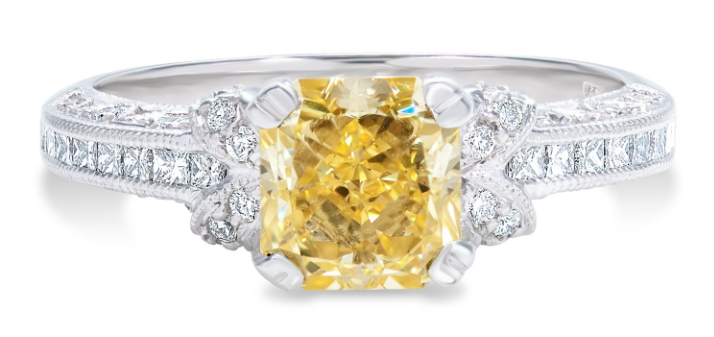 Platinum Ring with A Radiant Yellow Diamond Weighing 1.53ct (GIA), (16) Princess Cut And (28) Round Diamonds Weighing 0.36ct