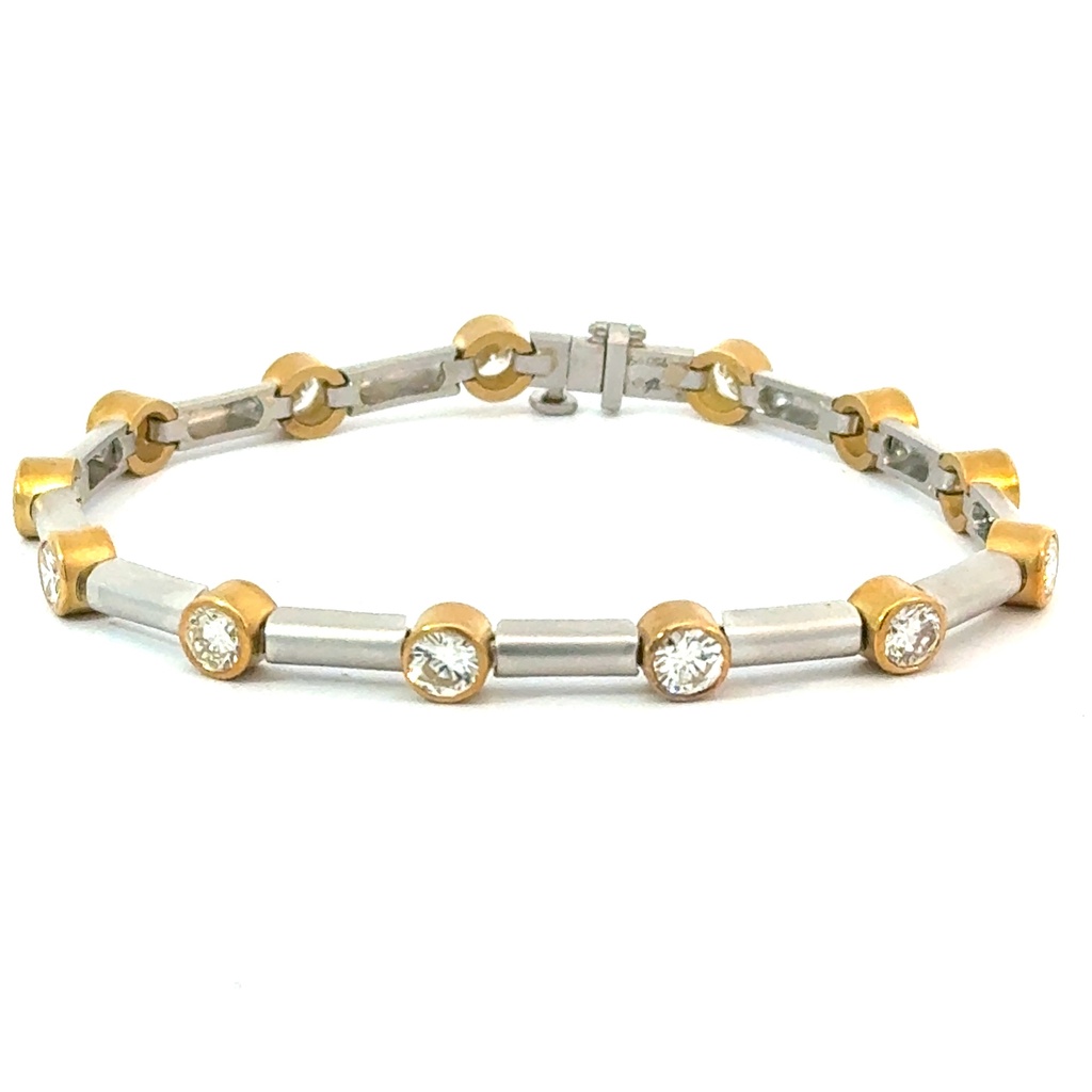 Platinum and 18Kt Yellow Gold Bracelet With (13) Round Diamonds Weighing 4.29cttw
