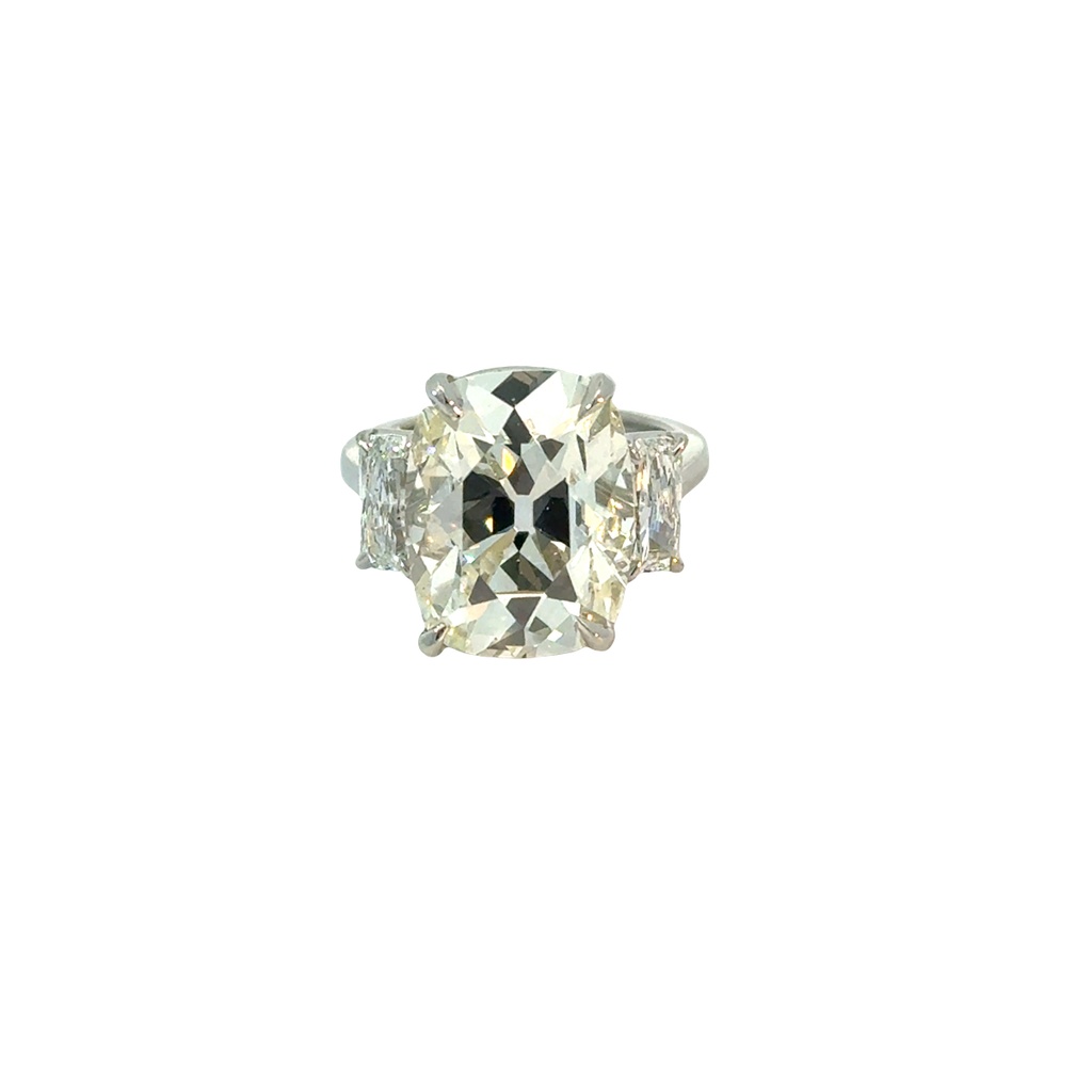Platinum Three Stone Ring With A Cushion Cut Diamond Weighing 10.75ct And (2) Radiant Cut Diamonds Weighing 1.29ct