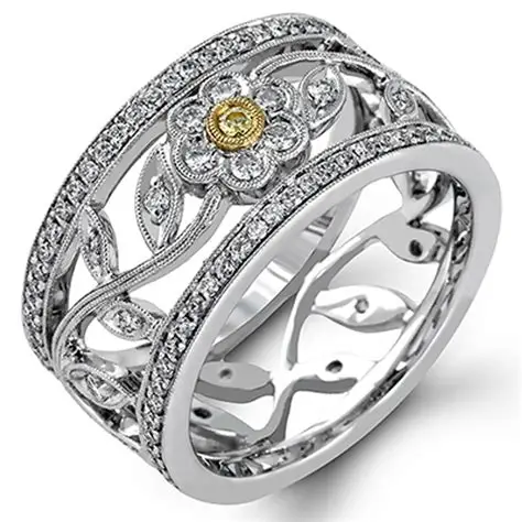 18Kt White Gold Flower Band With A Round Yellow Diamond Weighing 0.02ct And Round Diamonds Weighing 0.71ct                                                                                    