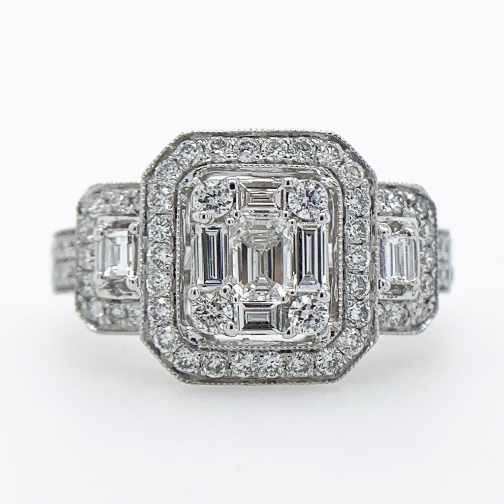 18Kt White Gold Halo Style Cluster Ring With (1) Emerald Cut Diamond Weighing 0.26ct, (6) Baguette Diamonds Weighing 0.27ct, and (64) Round Diamonds Weighing 0.70ct