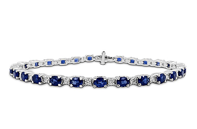 [B6021-S] 18Kt White Gold Tennis Bracelet With (27) Oval Sapphires Weighing 6.21ct And (27) Round Diamonds Weighing 0.81ct