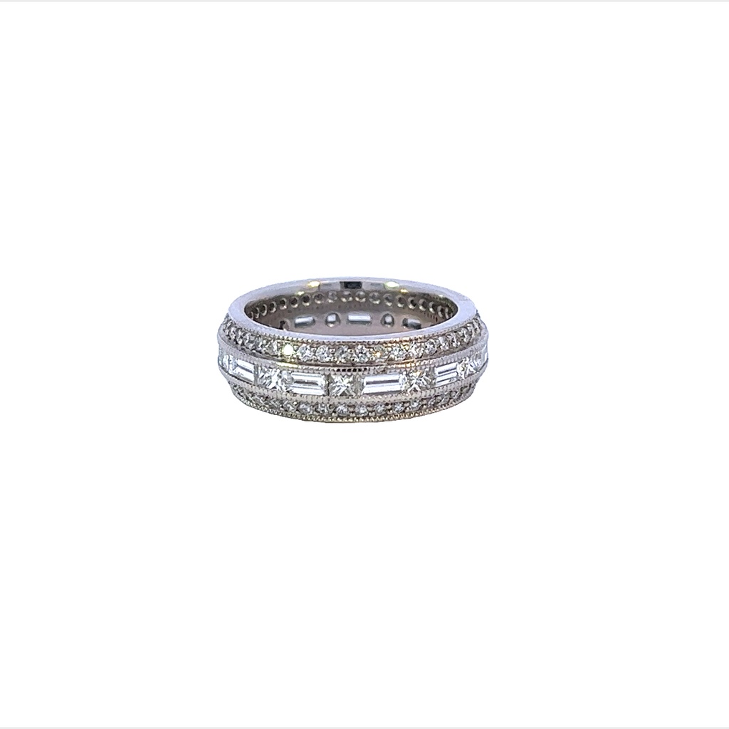 18Kt White Gold Band With Baguette And Princess Cut Diamonds Weighing 2.11ct And Round Diamonds Weighing 1.07ct