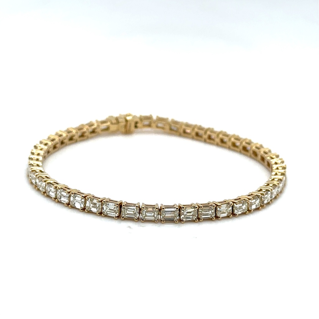 14Kt Yellow Gold Bezel Set Tennis Bracelet With (26) Emerald Cut Diamonds Weighing 9.23cttw