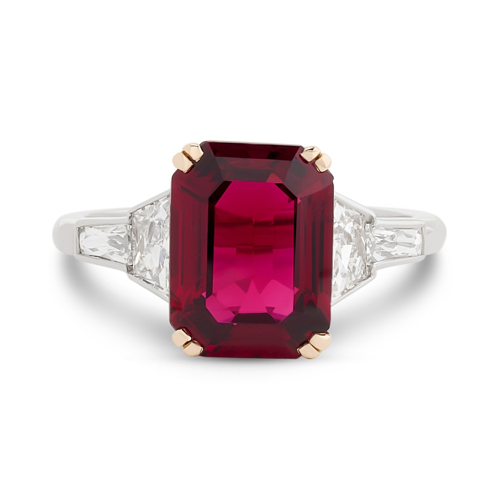 Platinum and 18Kt Yellow Gold  Ring With An Emerald Cut Spinel Weighing 3.39ct And (2) French Cut Trapezoid Diamonds Weighing 0.60ct, And (2) French Cut Baguette Diamonds Weighing 0.25ct