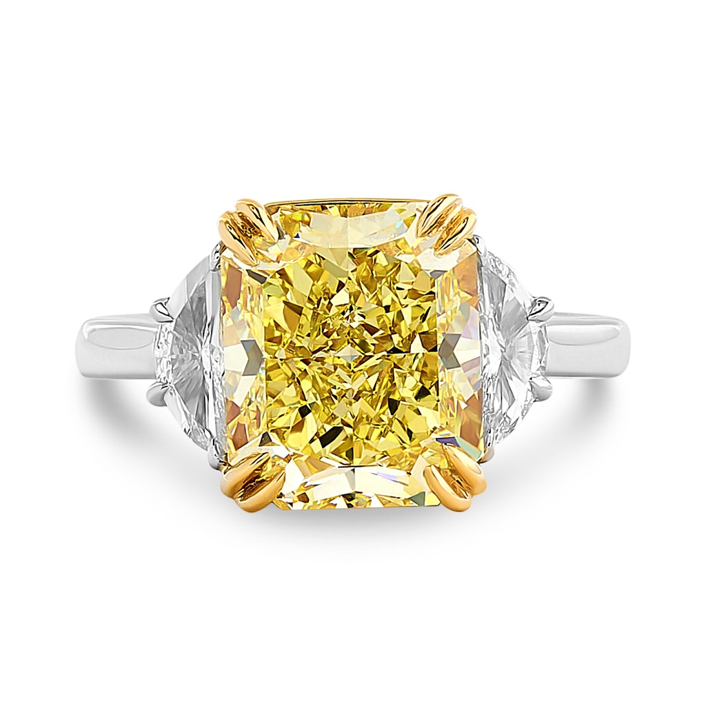 Platinum and 18Kt Yellow Gold Ring With A Radiant Cut Yellow Diamond Weighing 5.75ct And (2) Half Moon Diamonds Weighing 0.43ct
