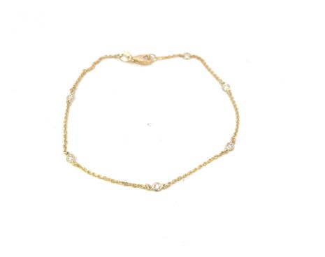 14Kt Yellow Gold Diamond By The Inch Bracelet With (5) Round Diamonds Weighing 0.12cttw