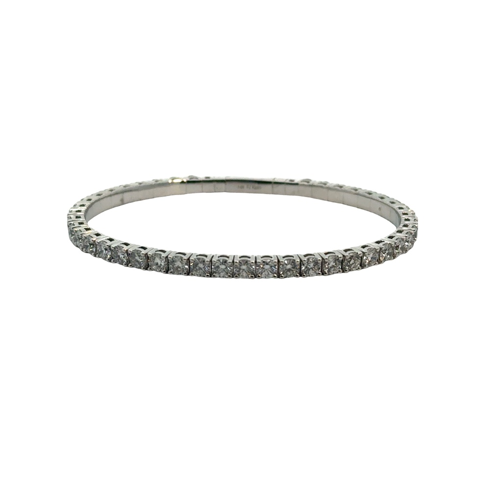 14Kt White Gold Flexi Bangle With (42) Round Diamonds Weighing 6.63cttw