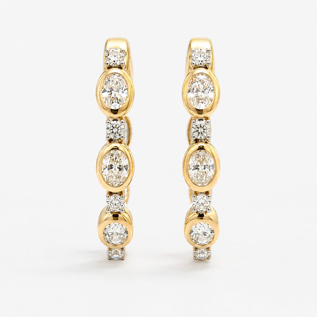18Kt Yellow Gold Hoops With Round Diamonds Weighing 0.18ct And Oval Diamonds Weighing 0.62ct