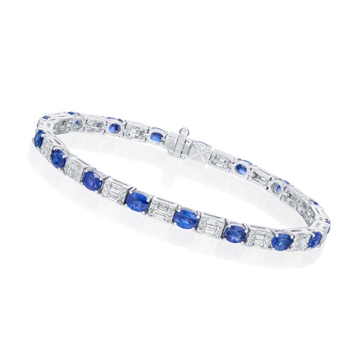 [21060] 18Kt White Gold Tennis Bracelet With 17 Oval Sapphires Weighing 7.88ct, 102 Round Diamonds Weighing 0.75ct, And 51 Baguette Diamonds Weighing 1.43ct