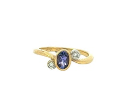 [M4451] 14Kt Yellow Gold Ring With And Oval Tanzanite Weighing 0.50ct And Round Diamonds Weighing 0.09ct
