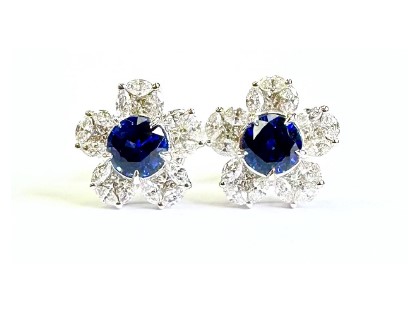 [22130] 18Kt White Gold Flower Studs With (2) Round Sapphires Weighing 0.99ct, (30) Marquise And (10) Princess Cut Sapphires Weighing 0.87ct