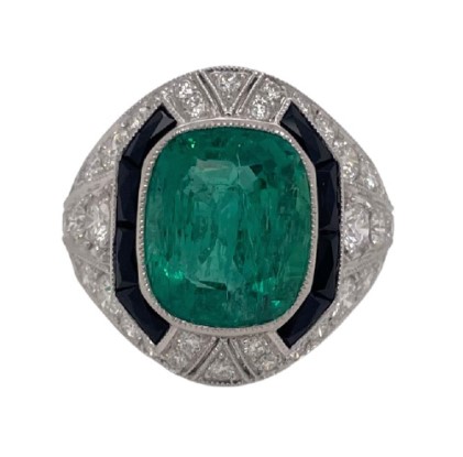 [19571] Platinum Ring With A Cushion Cut Emerald Weighing 6.6ct, (48) Round Diamonds Weighing 1.63ct, And Black Onyx Weighing 0.59ct