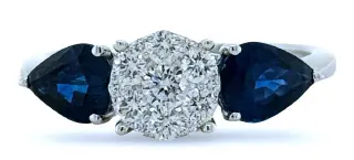 [22433] 18Kt White Gold Ring With (2) Pear Shaped Sapphires Weighing 1.67ct And (13) Round Diamonds Weighing 0.36ct