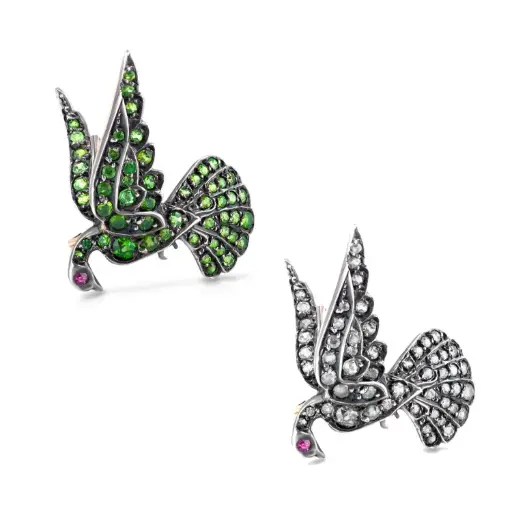 [BR56576.1] Pair of Bird Pins, (1) Demantoid And Tsavorite With A Ruby Eye, (1) Diamond And Ruby Eye 0.75ct In Silver on Yellow Gold