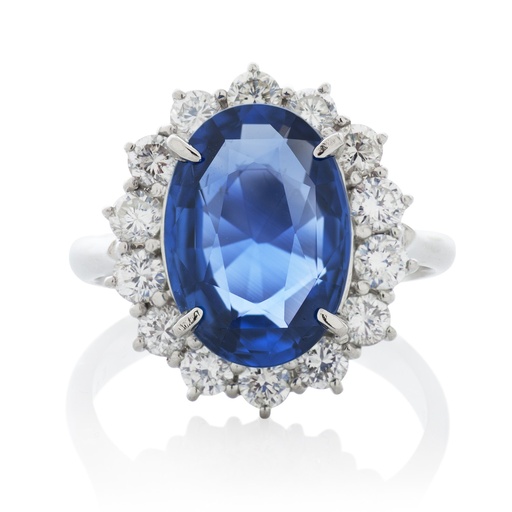 [R73472.3] Platinum Halo Ring With An Oval Sapphire Weighing 5.02ct And (14) Round Diamonds Weighing 1.08cttw