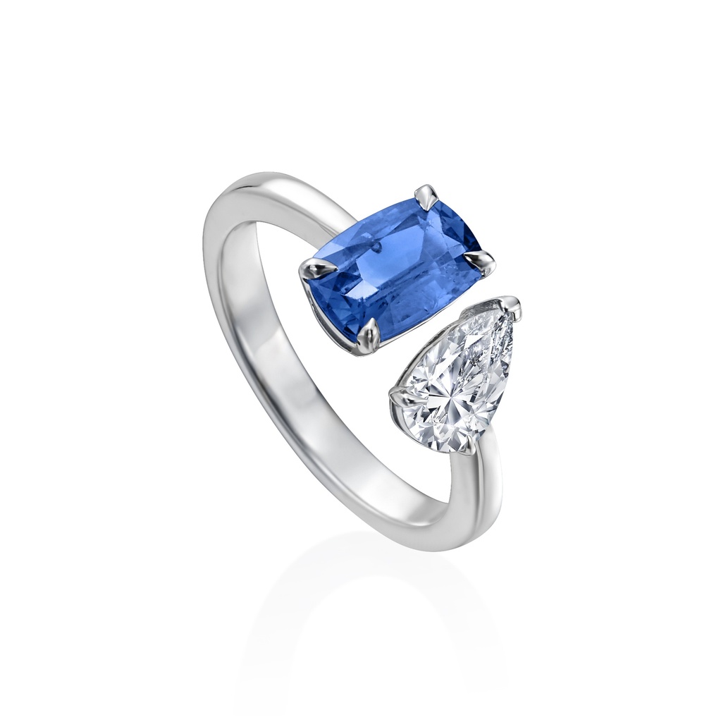 White Gold Toi et Moi Ring With An Emerald Cut Sapphire Weighing 1.46ct And A Pear Shaped Diamond Weighing 0.62ct