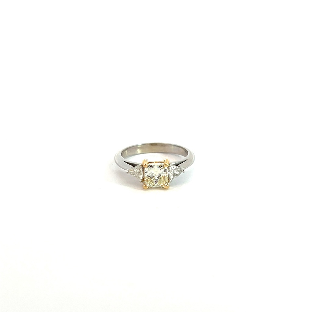 14/18Kt Two Toned Three Stone Ring With A Radiant Cut Diamond Weighing 1.11ct And (2) Trillion Cut Diamonds Weighing 0.38ct