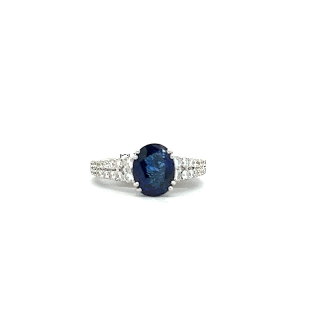White Gold Ring With An Oval Sapphire Weighing 1.96ct And A Two Row Round Diamond Band Weighing 0.60ct