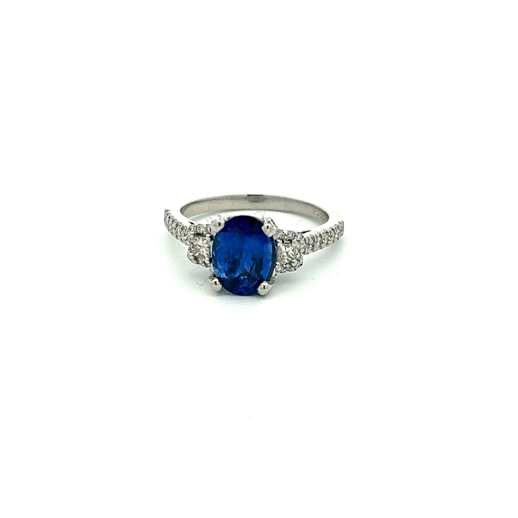 Platinum Ring With An Oval Sapphire Weighing 2.20ct And Diamond Side Stones With A Half Eternity Band