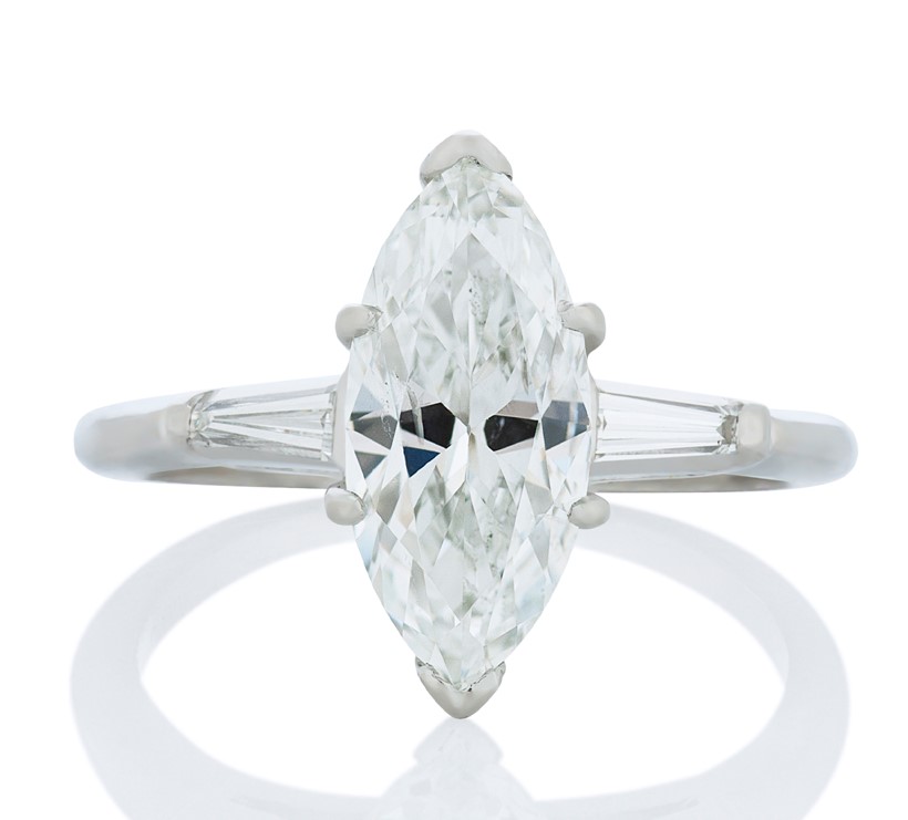 Platinum Three Stone Ring With A Marquise Diamond Weighing 2.05ct And 2 Tapered Baguette Diamonds Weighing 0.25ct