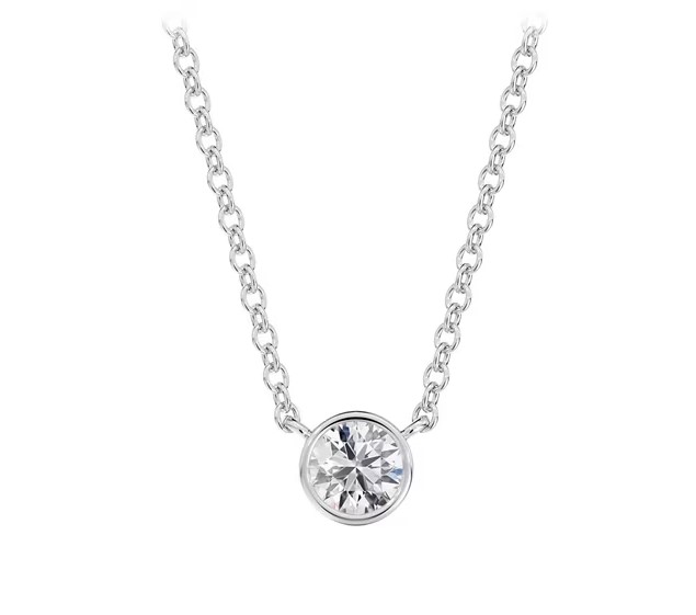18Kt White Gold Tribute Necklace With A Round Diamond Weighing 0.20ct
