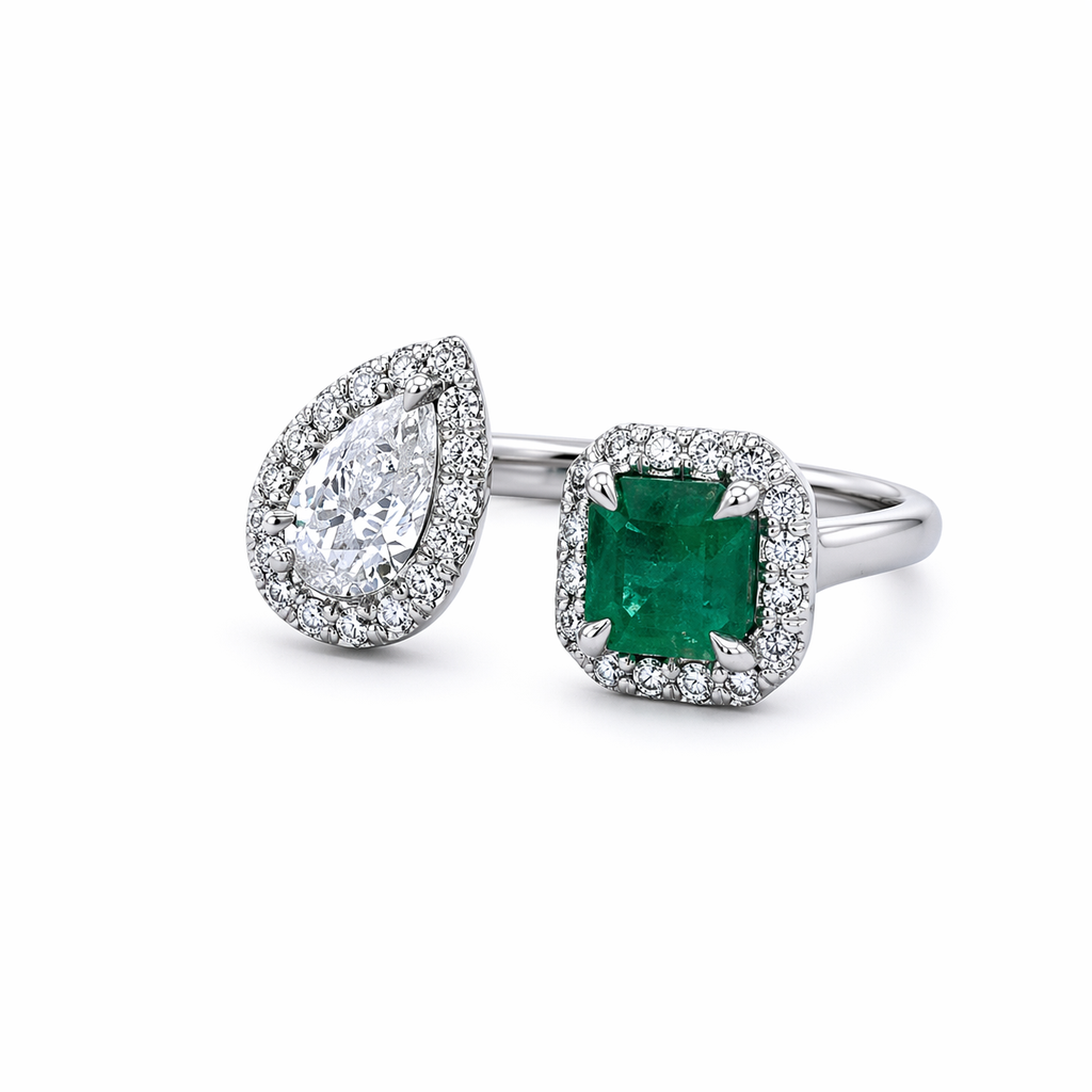 [6710] 14Kt White Gold Open Space Ring With A Cushion Emerald Weighing 0.64ct, A Pear Shaped Diamond Weighing 0.46ct, And (32) Round Diamonds Weighing 0.30ct