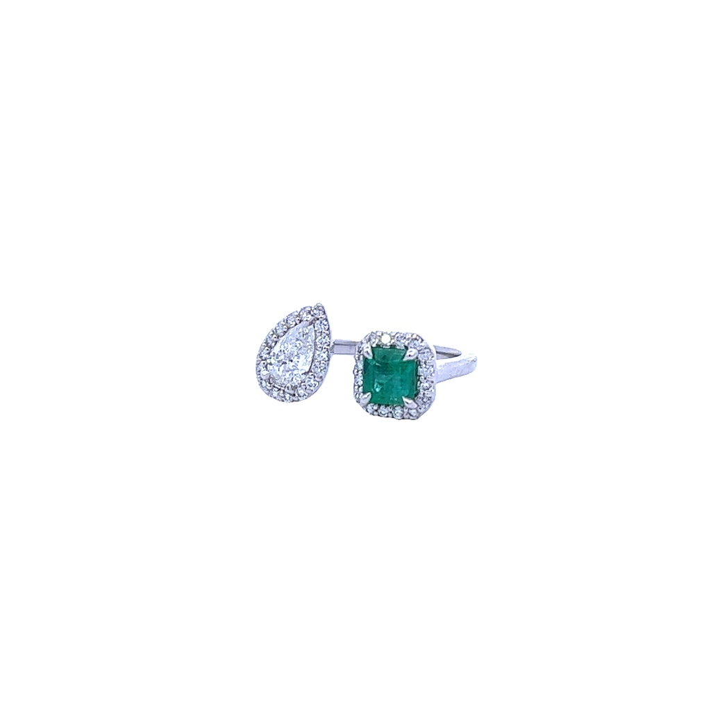 14Kt White Gold Open Space Ring With A Cushion Emerald Weighing 0.64ct, A Pear Shaped Diamond Weighing 0.46ct, And (32) Round Diamonds Weighing 0.30ct