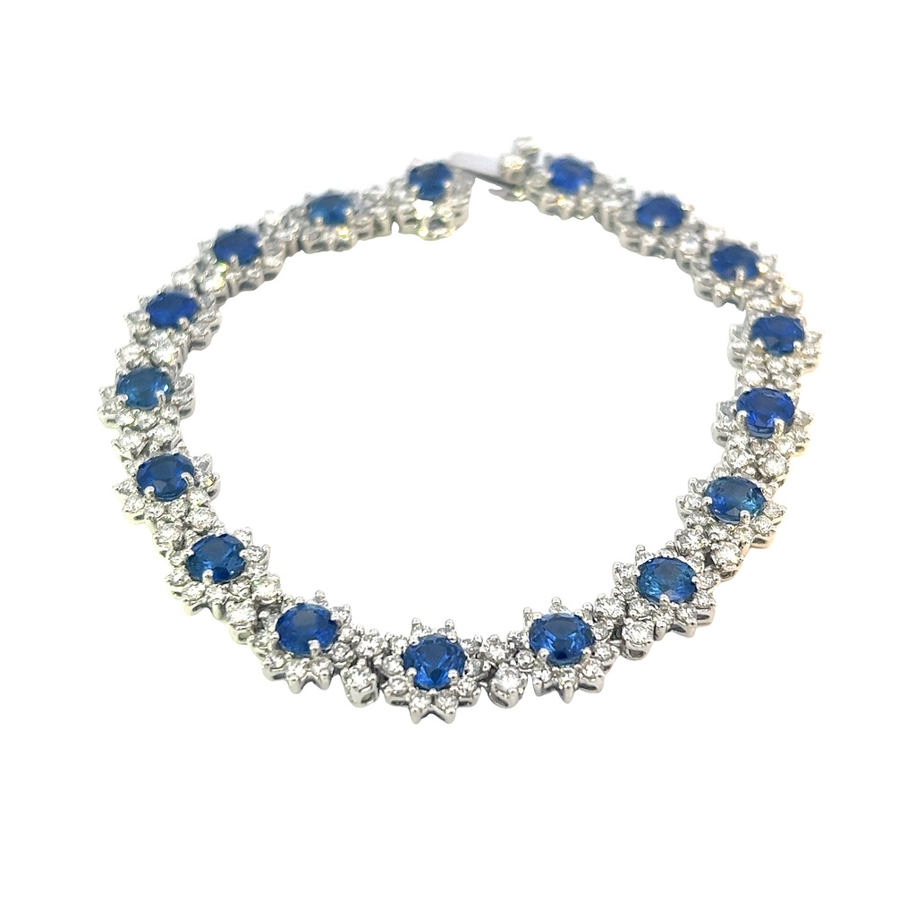 18Kt White Gold Halo Style Bracelet With (17) Round Sapphires Weighing 9.10ct And (204) Round Diamonds Weighing 5.85ct