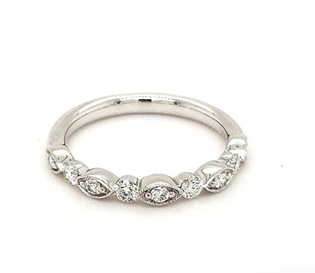 14Kt White Gold Illusion Band With (9) Round Diamonds Weighing 0.25cttw
