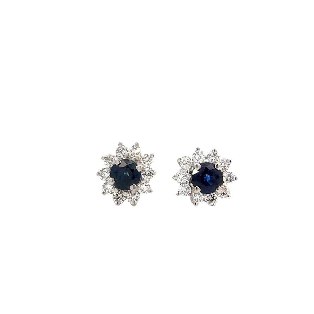 18Kt White Gold Halo Style Studs With (2) Round Sapphires Weighing 1.10ct And (20) Round Diamonds Weighing 1.00ct