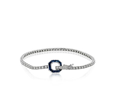 18Kt White Gold Bracelet With A (16) Princess Cut Sapphire Lock And (72) Round Diamonds Weighing 0.74ct