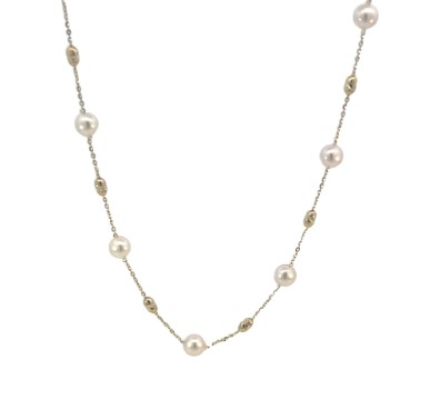 14Kt Yellow Gold Station Necklace With (17) 5x4.5mm Cultured Pearls 20"