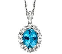 18Kt White Gold Halo Style Necklace With An Oval Aquamarine Weighing 1.75ct And (12) Round Diamonds Weighing 0.54ct