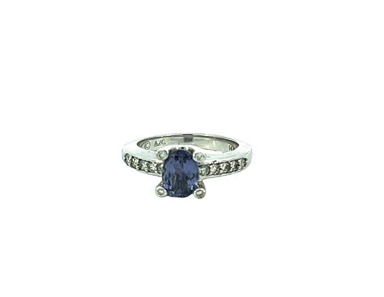 14Kt White Gold Ring With An Oval Tanzanite Weighing 1.36ct And Round Diamonds Weighing 0.32ct