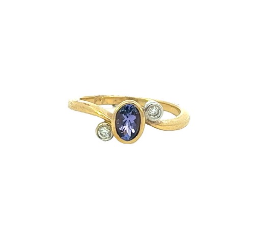 14Kt Yellow Gold Ring With And Oval Tanzanite Weighing 0.50ct And Round Diamonds Weighing 0.09ct