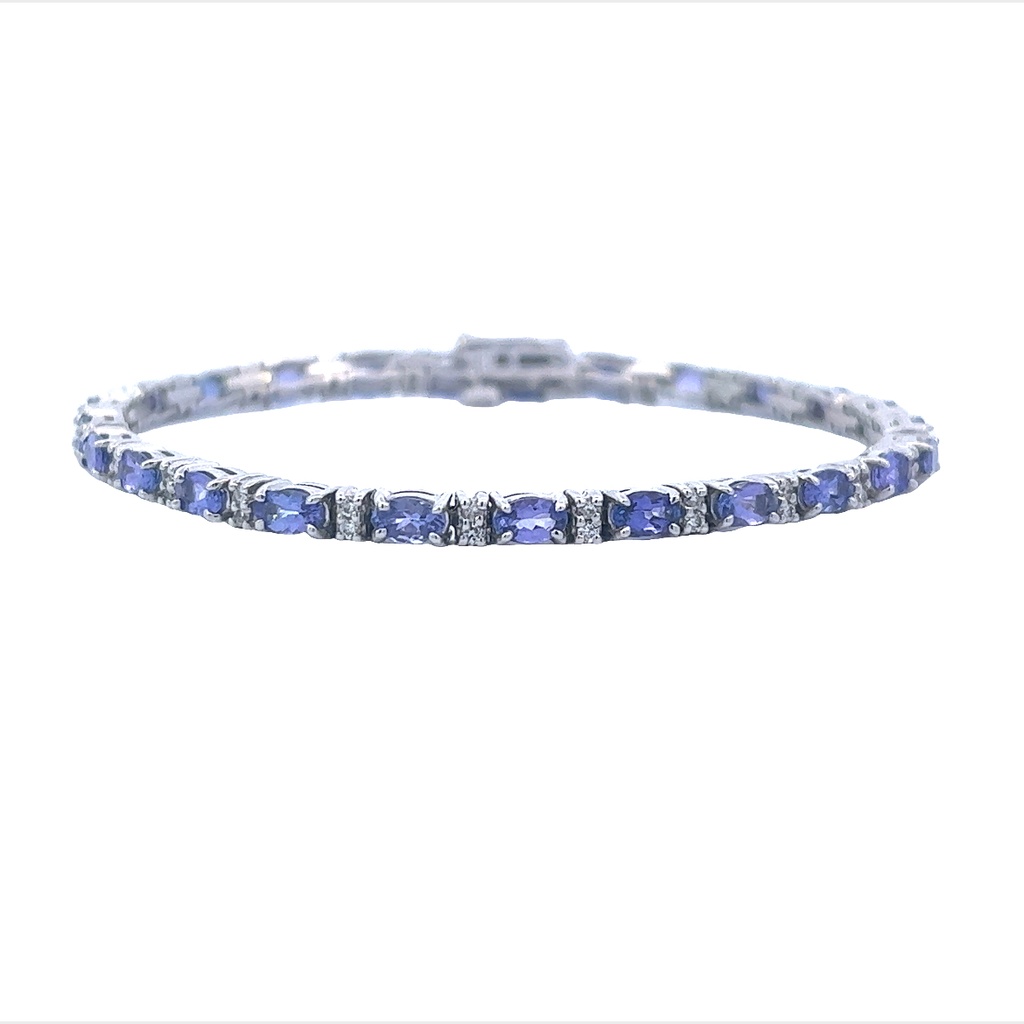 14Kt White Gold Tennis Bracelet With 25 Oval Tanzanites Weighing 5.50ct And 50 Round Diamonds Weighing 0.65ct
