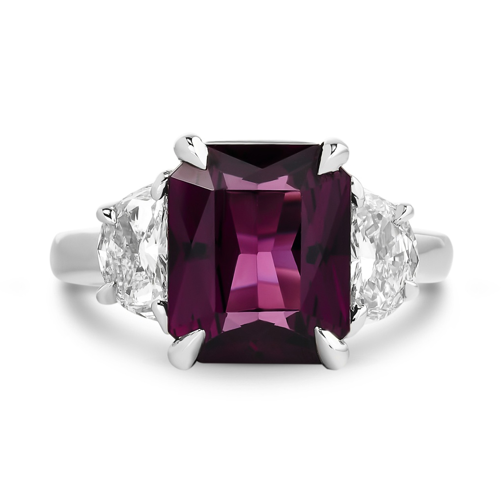 Platinum Three Stone Ring With An Emerald Cut Spinel Weighing 4.05ct And Two Half Moon Diamonds Weighing 0.87ct