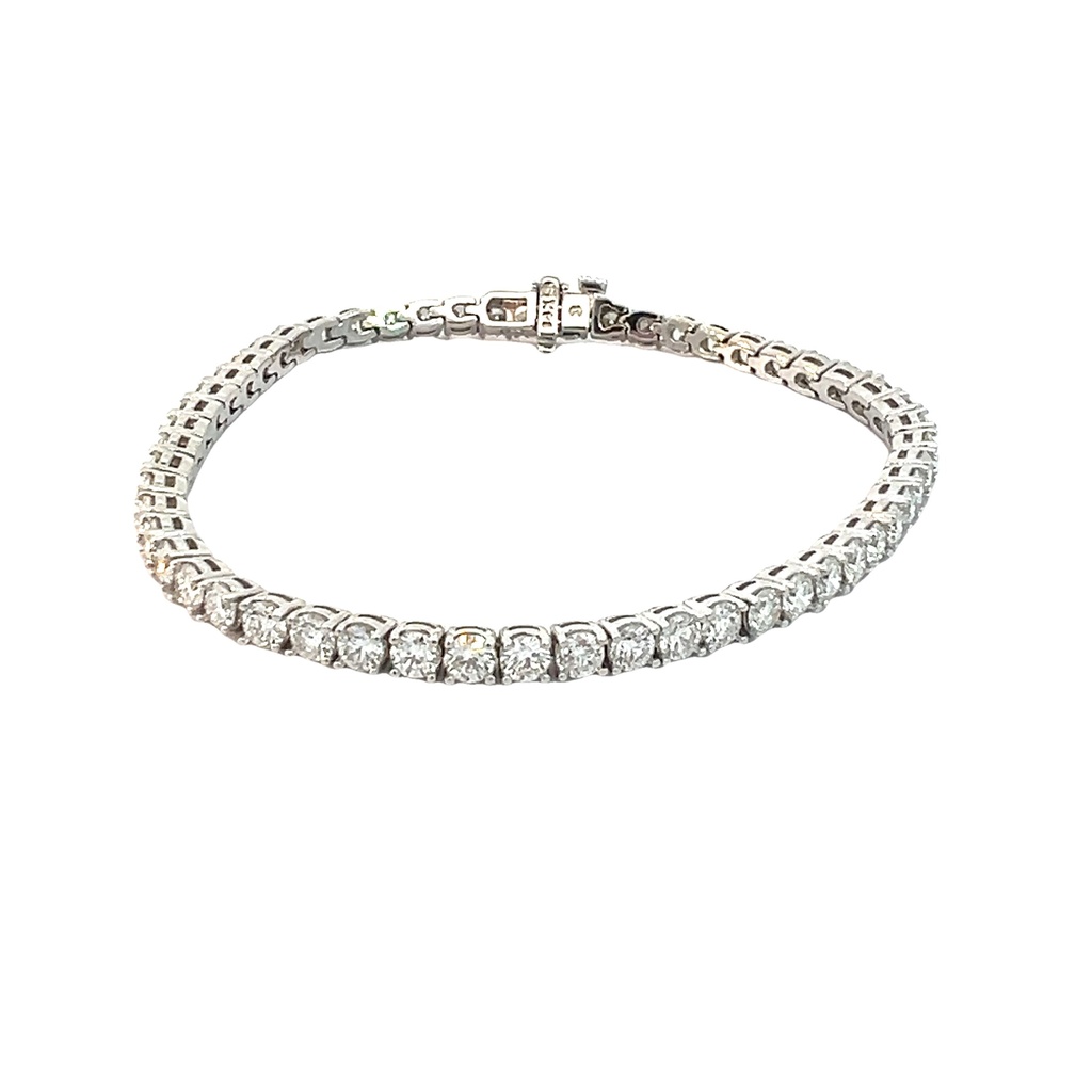 14Kt White Gold Tennis Bracelet With (54) Round Diamonds Weighing 6.48cttw