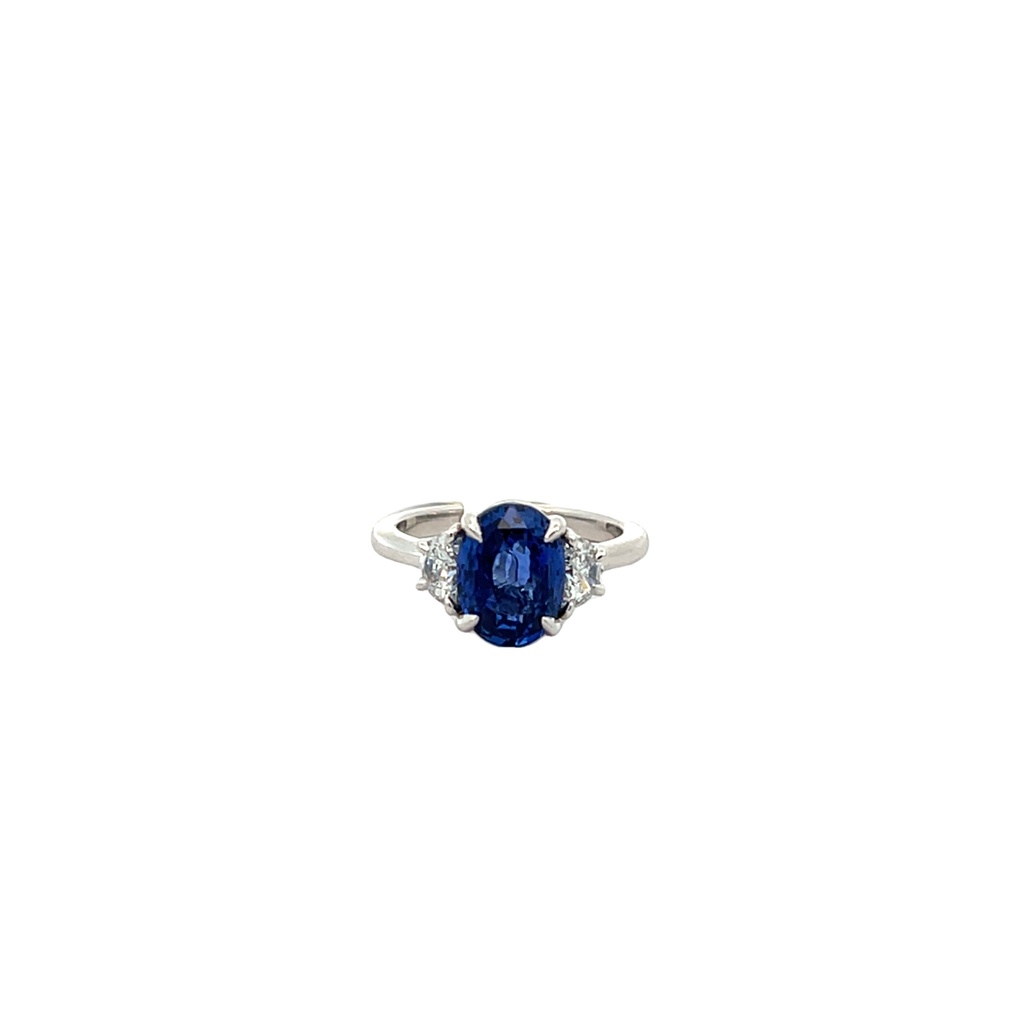 Platinum Three Stone Ring With An Oval Sapphire Weighing 4.08ct And (2) Half Moon Diamonds Weighing 0.47ct
